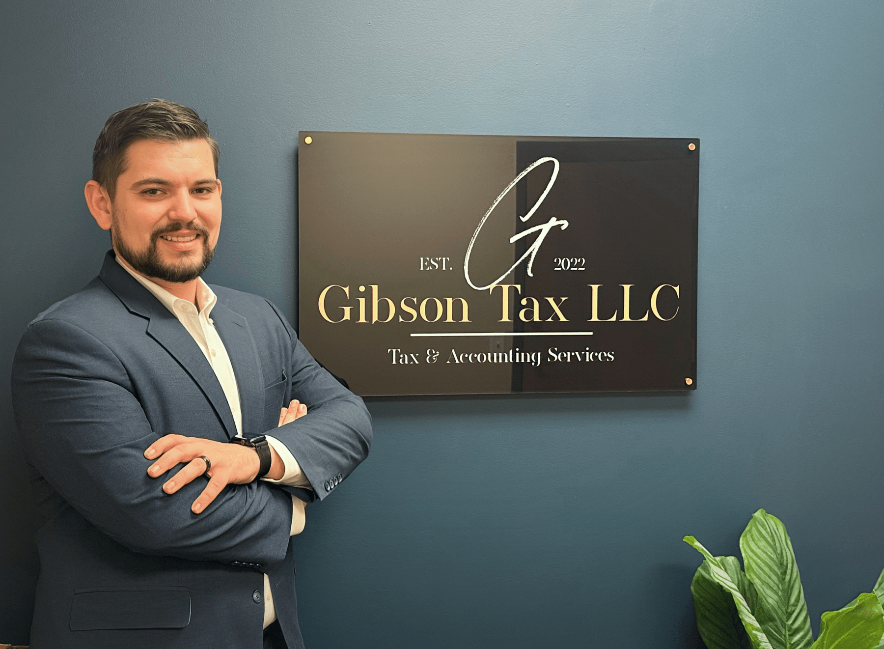 Owner Dakota Gibson poses for an image at Gibson Tax in Asheboro, NC